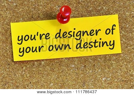You're Designer Of Your Own Destiny Word On Yellow Notepaper With Cork Background