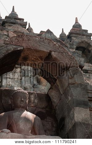 Sitting Buddha in stone at Borobudur