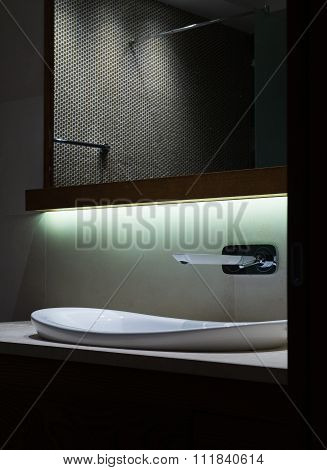 Lavatory And Mirror In Modern Bathroom Interior