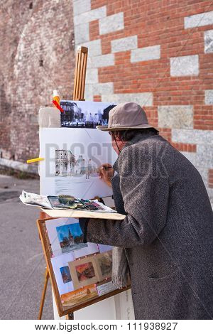 Painter Working In The Street