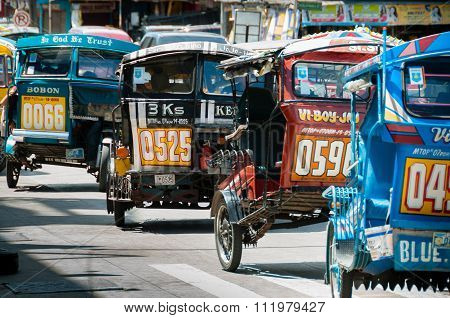 Filipino Tricycles Caught Up In a Traffic