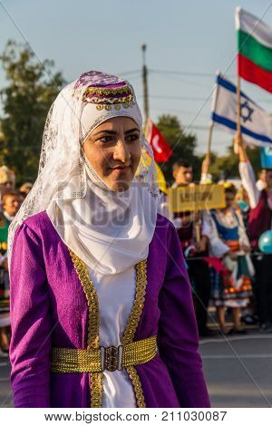 Girl In A Traditional Turkish Clothing During Festival