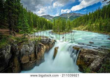 Upper Sunwapta Falls in Jasper National Park, Canada. The water originates from the Athabasca Glacier. Long exposure.