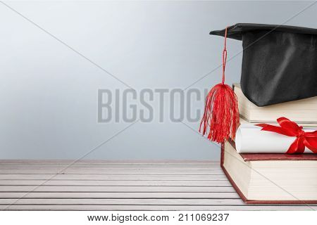 Stack hat graduation grad white background celebration