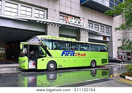 Novena, Singapore - February 21, 2017: A FirstCoach long distance bus is ready at the Velocity Novena Square shopping center to depart for Bandar Utama / Kuala Lumpur in Malaysia.