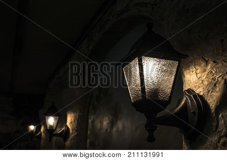 Old metal lantern. Old metal medieval lamp