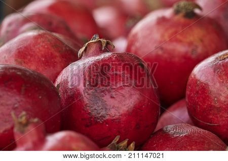 ripe red pomegranate as a fruit bacjground