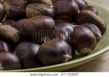 a dish full of chestnuts. autumn food.