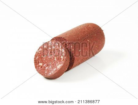 half a blood sausage on white background