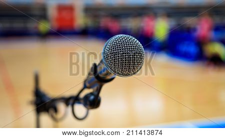 Microphone closeup on a blurred background, copy spece