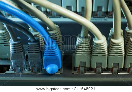 network hub with a lot of connected wires
