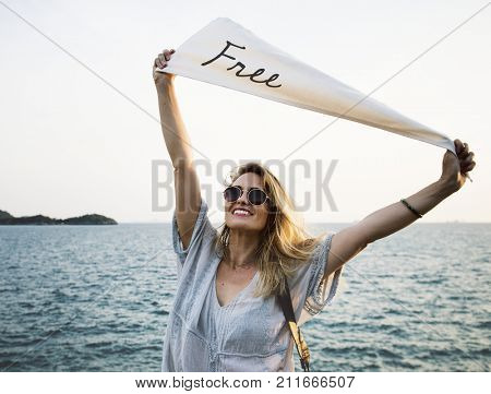 Woman smiling and chill out by the sea