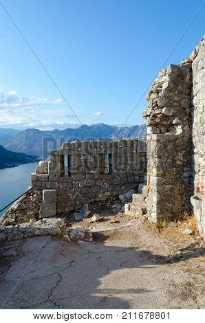 Ruins of ancient fortress of St. John (Illyrian Fort) over city of Kotor and Bay of Kotor Montenegro