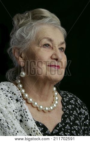 A Very Old Woman. An Eighty-year-old Woman. Studio Portrait Of An Old Woman