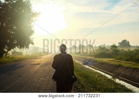 Buddha Monk Walking Dhutanga For Food Donation In The Morning