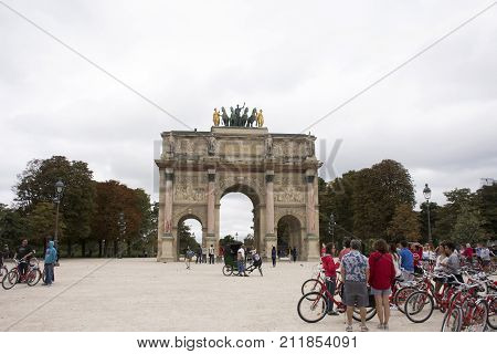 French People And Foreigner Travelers Walking Visit Carrousel Arc De Triomphe Or Arc De Triomphe Du