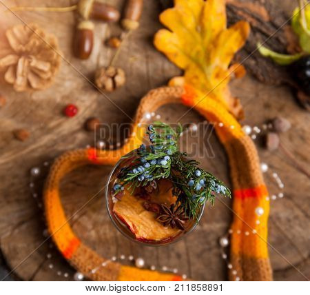 Christmas Hot Mulled Wine With Cinnamon Cardamom And Anise On Wooden Background
