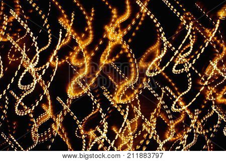 Abstract Bright Multicolored Glowing Lines and Curves on Black Background.