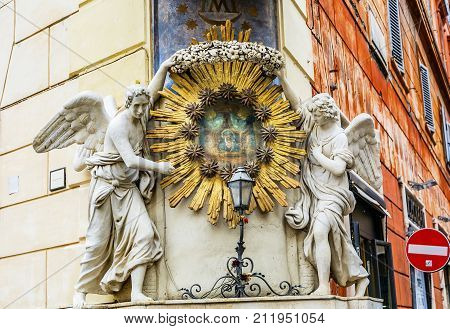 Madonna del Archetto Angels Statues Street Piazza de Trevi Fountain Rome Italy. Small church created in 1800s to commemorate madonna picture with moving eyes