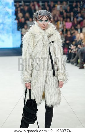 ZAGREB, CROATIA - OCTOBER 28, 2017: Fashion model wearing clothes designed by Marina Design and acessories designed by Marija Ivankovic at the 'Fashion.hr' fashion show