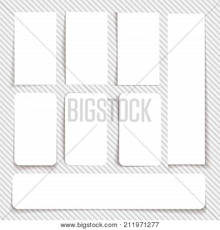 Set of empty white cards of different sizes and with different types of edges