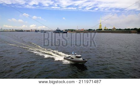 Overlooking the waters of the Neva river in St. Petersburg with sailing ships during the celebration of Navy day