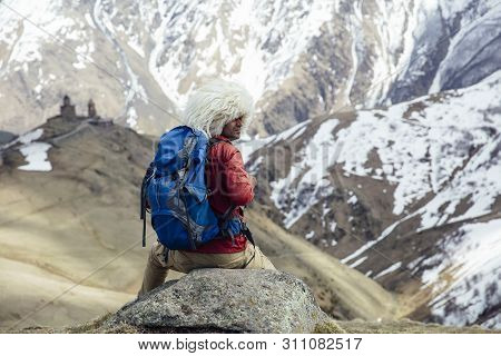 Hiker With Traditional Papakha Fur Hat At Mtskheta-mtianeti Region In Georgia