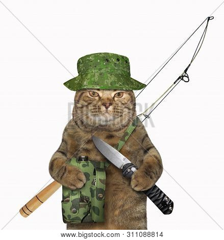 The Cat Fisher In Uniform With A Fishing Rod And A Bag Is Holding A Big Jackknife. White Background.
