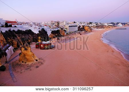 Albufeira, Algarve, Portugal - Mai 26, 2019:  Aerial View On The Beach Albufeira On The Sunset.