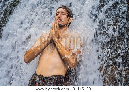 Young Man Tourist In Holy Springs Sebatu In Bali