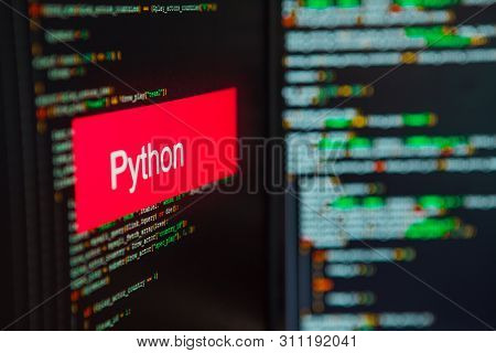 Programming Language, Python Inscription On The Background Of Computer Code. Modern Digital Technolo