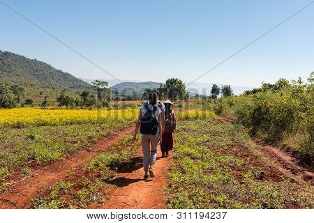 Inle Lake, Myanmar - 28 November, 2018: Horizontal Picture Of Tourists Treeking To Inle Lake In A Co