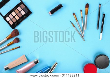 Flat Lay.palette Of Shadows And Makeup Brushes. Powder, Concealer, Highlighter, Mascara, Lipstick