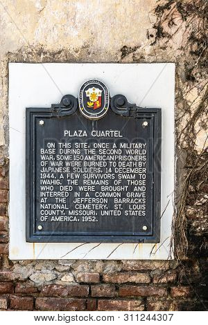Puerto Princesa, Palawan, Philippines - March 3, 2019: Sign At Plaza Quartel Entrance Tells Cruel Ww