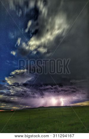 Huge Tunderstorm, Lightning Caught In The Distance
