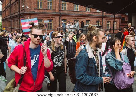 Helsinki, Finland - June 29, 2019: Antifascism Activists With Poster 