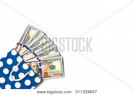 Isolated 100 Us Dollars Banknotes Bills Are Coming Out Of A Blue Paper Bag On White Background. Shop