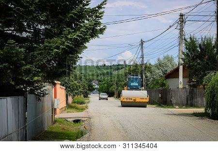 Targoviste, Romania - 2019. Large View On The Road Rollers Working On The New Road Construction Site