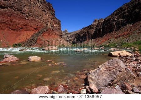 Hance Rapids With Its Colorful Rocks And Boulders In Grand Canyon National Park, Arizona.