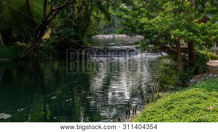 Beautiful Waterfall In Thailand, Near The Namtok Chet Sao Noi Park, Saraburi, Featuring Lush Green T