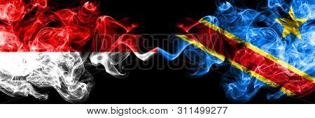 Indonesia Vs Democratic Republic Of The Congo Smoky Mystic Flags Placed Side By Side. Thick Colored 