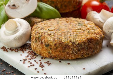 Tasty Vegetarian And Vegan Burgers Made From Healthy Quinoa, Basil, Tomatoes And Champignon Mushroom