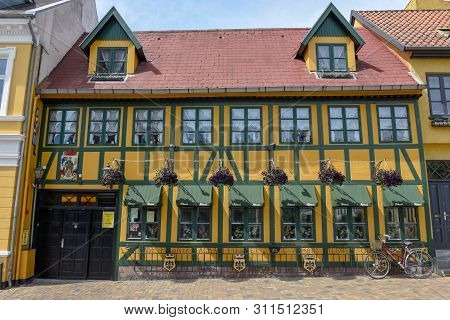 Restaurant On A Traditional Historic House At Odense On Denmark