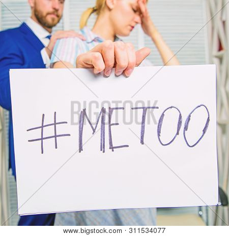 Assault Targeted At Employee. Girl Hold Poster Hashtag Me Too While Colleague Calm Down Her. Share A
