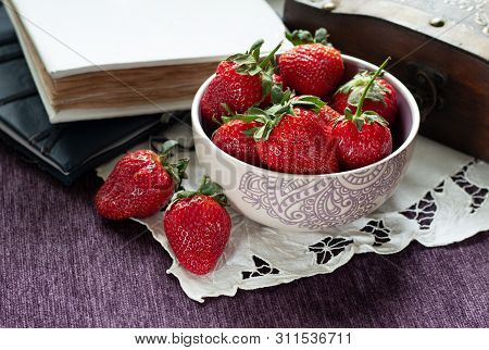 Fragrant Strawberry In A Purple Bowl. Delicious Breakfast.