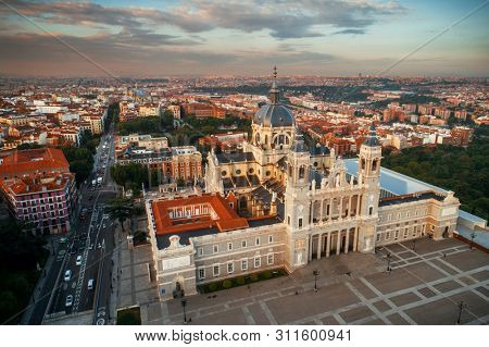 Aerial view of Catedral de la Almudena (Almudena Cathedral) at sunrise in Madrid, Spain.