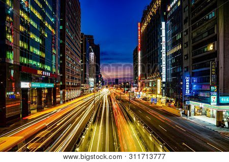Taipei, Taiwan - 2 Oct, 2017: Taipei Main Road In The Twilight Time With Building And Lightbow Envir