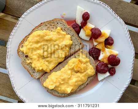 Scrambled Eggs With Goat Cheese, Strawberry And Orange Jam / Marmalade