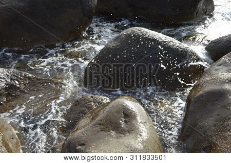 Big Stones Infiltrated By Water And Drops