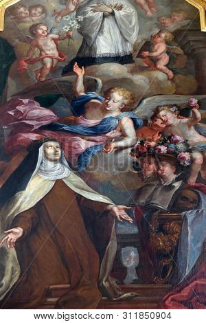 LUCERNE, SWITZERLAND - JUNE 24, 2018: Saint Mary Magdalene de Pazzi, Saint Aloysius Gonzaga altar in Jesuit church of St. Francis Xavier in Lucerne, Switzerland
